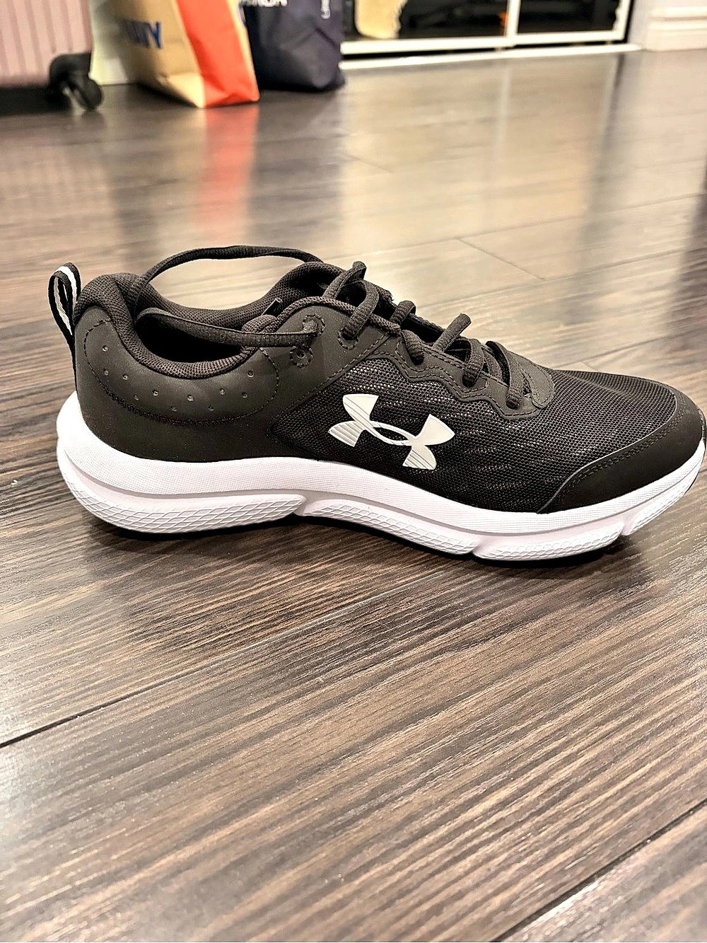 Under Armour Charged Assert 9 Black & White Athletic Shoes